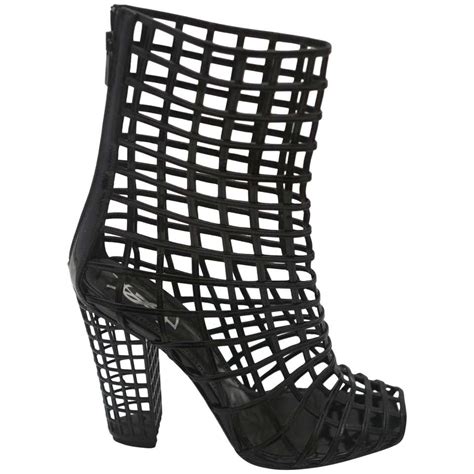 buy ysl cage boots|ysl saint laurent boots.